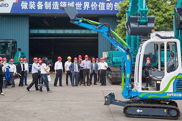 加拿大国会议员谭耕一行来k豆钱包智能调查