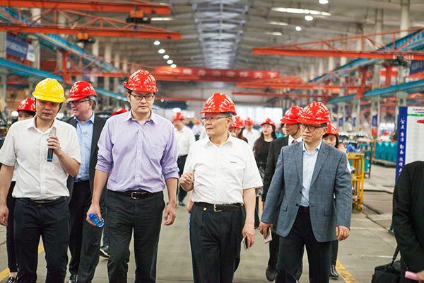 加拿大国会议员谭耕一行来k豆钱包智能调查